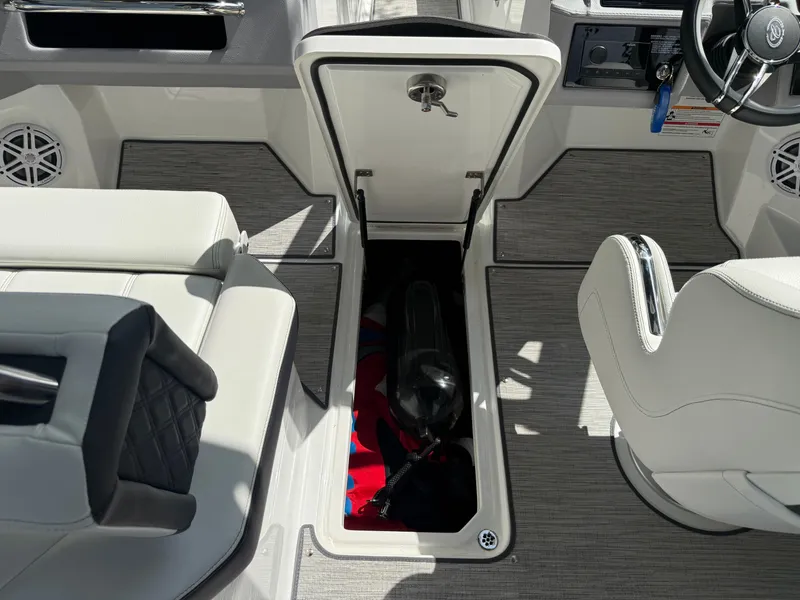 Slide: The Image of Interior of 2025 Cobalt R4 boat with storage compartment. - 11