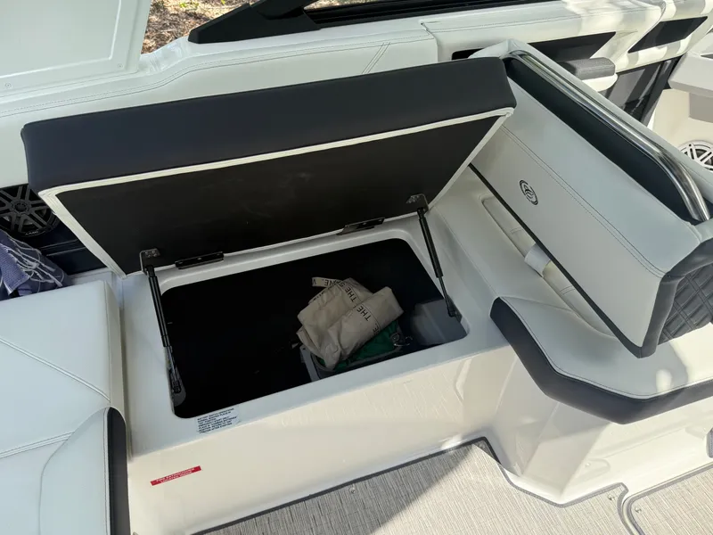 Slide: The Image of Open storage compartment in Cobalt R4 boat, 2025 model. - 13