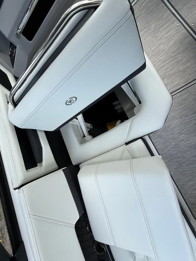 Slide: The Image of Interior of 2025 Cobalt R4 with white leather seats. - 17