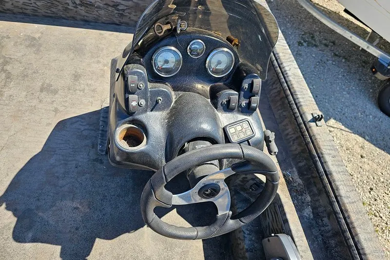 Slide: The Image of Steering console of 2020 Xpress XP200 Catfish boat with gauges and controls. - 13