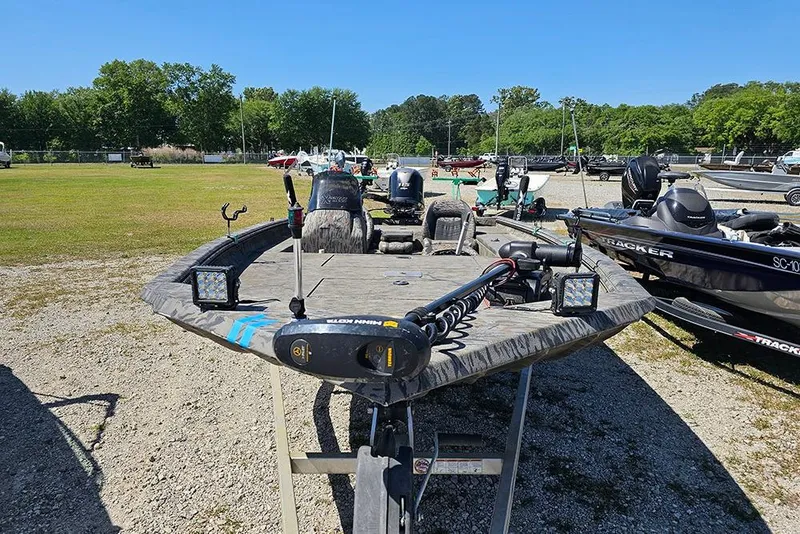 Slide: The Image of 2020 Xpress XP200 Catfish boat parked outdoors on a sunny day. - 4