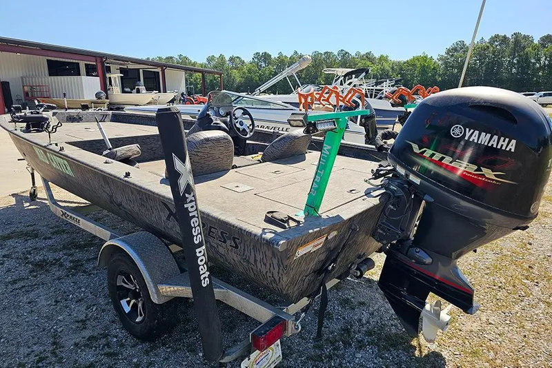 Slide: The Image of 2020 Xpress XP200 Catfish boat with Yamaha outboard motor in a dealership lot. - 6