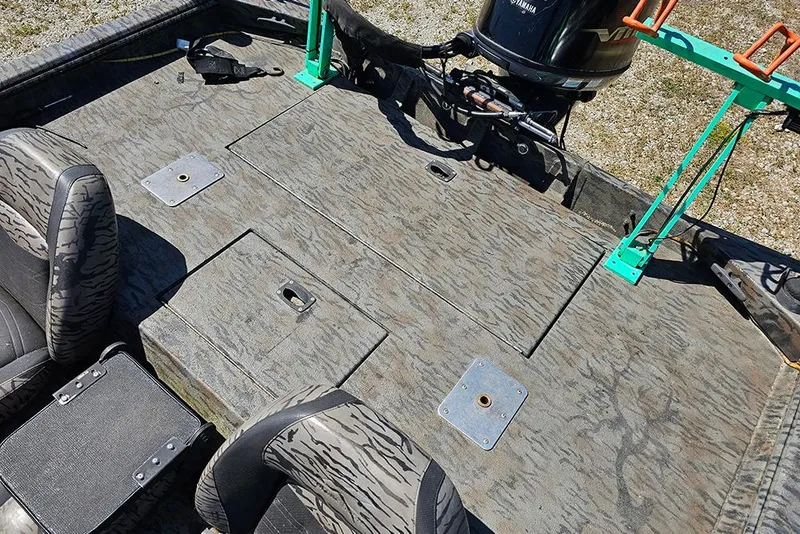 Slide: The Image of 2020 Xpress XP200 Catfish boat interior with camo seats and Yamaha motor. - 8