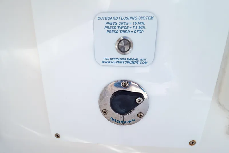 Slide: The Image of Outboard flushing system controls on a 2014 Intrepid 375 Walkaround boat. - 110