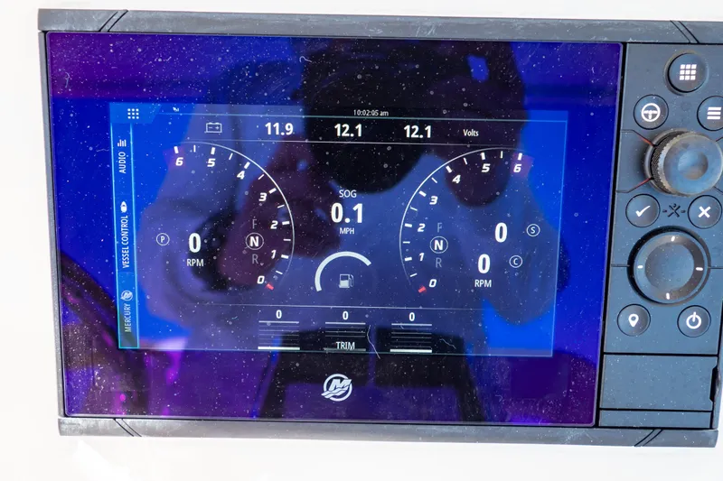 Slide: The Image of Digital dashboard display of a 2014 Intrepid 375 Walkaround boat, showing speed and RPM. - 21