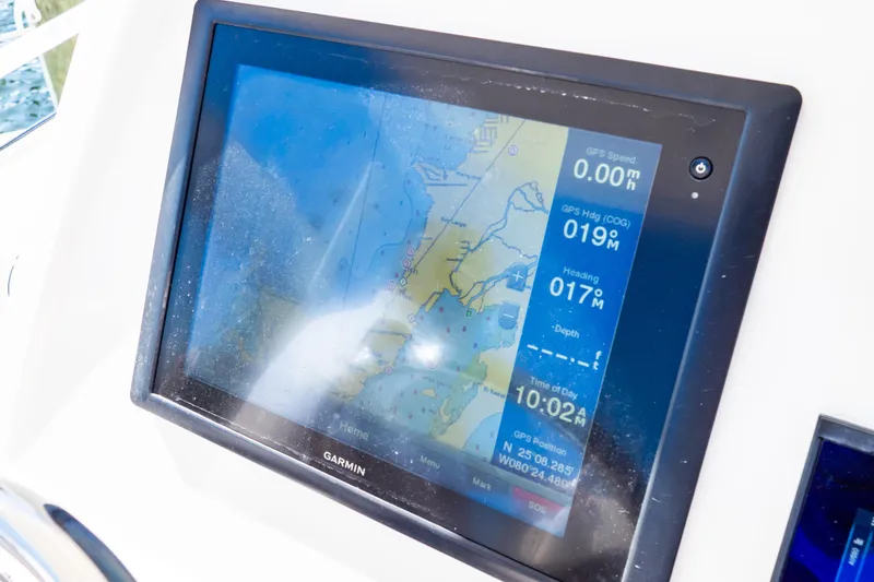 Slide: The Image of Garmin GPS display on 2014 Intrepid 375 Walkaround boat, showing navigation details. - 22