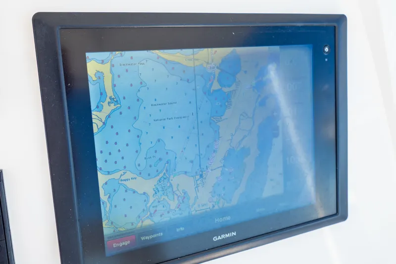 Slide: The Image of Garmin navigation display on 2014 Intrepid 375 Walkaround boat, showing detailed marine map. - 23