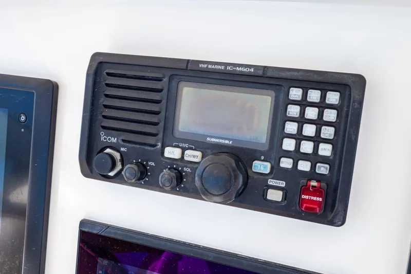 Slide: The Image of VHF marine radio on 2014 Intrepid 375 Walkaround boat dashboard. - 26