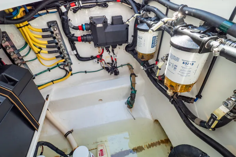 Slide: The Image of Engine compartment of a 2014 Intrepid 375 Walkaround with wiring and fuel filters. - 31