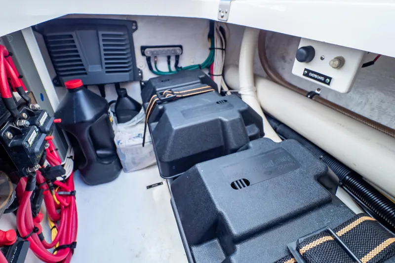 Slide: The Image of Engine compartment of a 2014 Intrepid 375 Walkaround with batteries and wiring. - 36