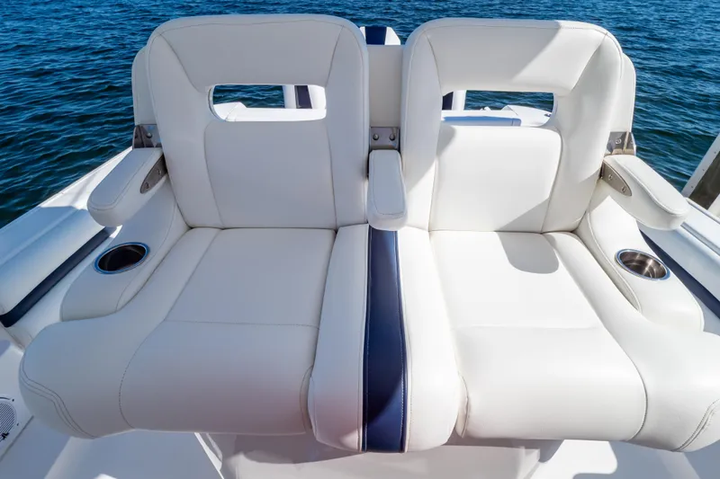 Slide: The Image of Luxurious seating on 2014 Intrepid 375 Walkaround boat with ocean backdrop. - 37