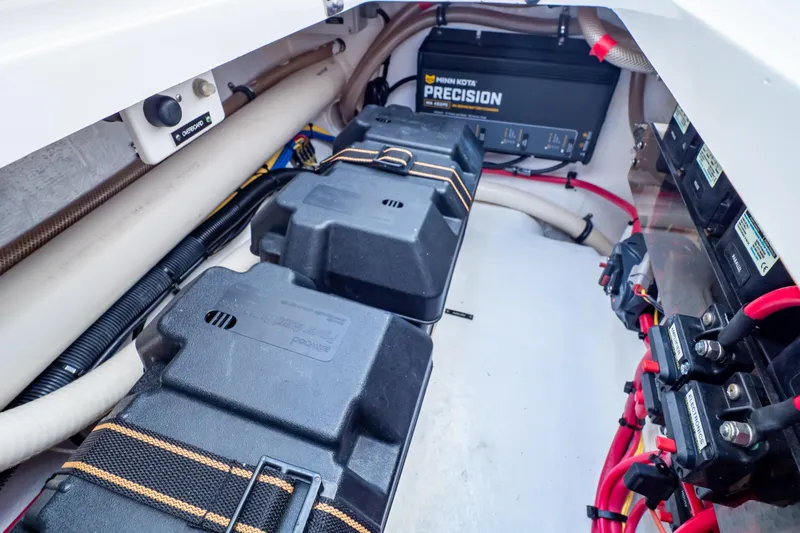 Slide: The Image of Electrical compartment of a 2014 Intrepid 375 Walkaround boat with battery setup. - 38