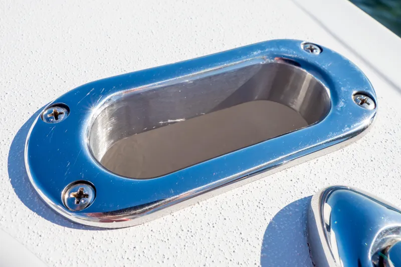 Slide: The Image of Close-up of a 2014 Intrepid 375 Walkaround boat's polished metal fitting. - 62
