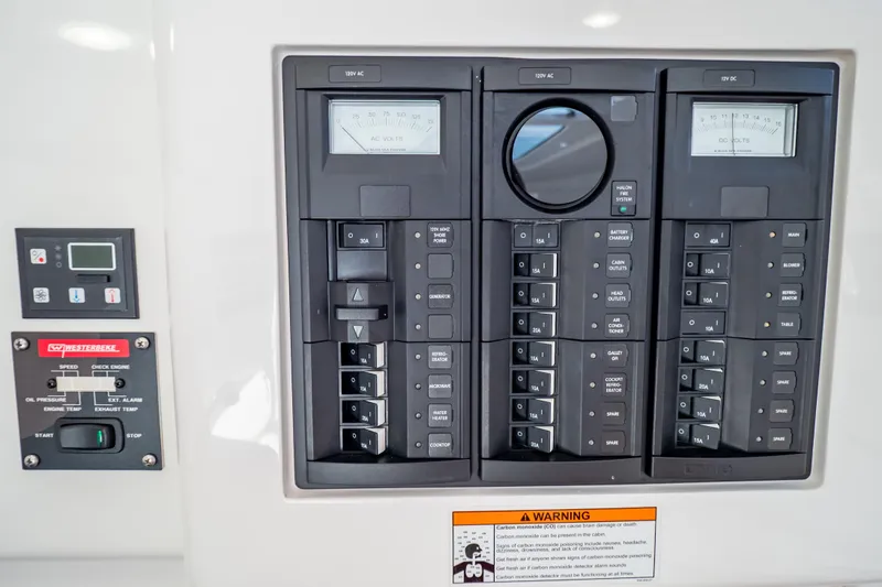 Slide: The Image of Electrical control panel on a 2014 Intrepid 375 Walkaround boat. - 70