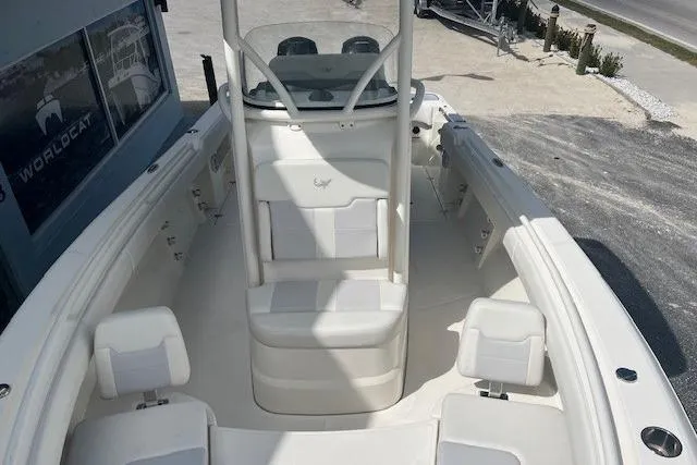 Slide: The Image of 2021 Mako 236 Center Console boat with spacious seating and modern design. - 6