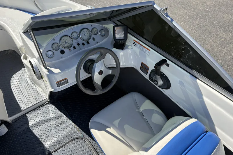 Slide: The Image of 2007 Bayliner 175 Bowrider dashboard with steering wheel and instrument panel. - 11