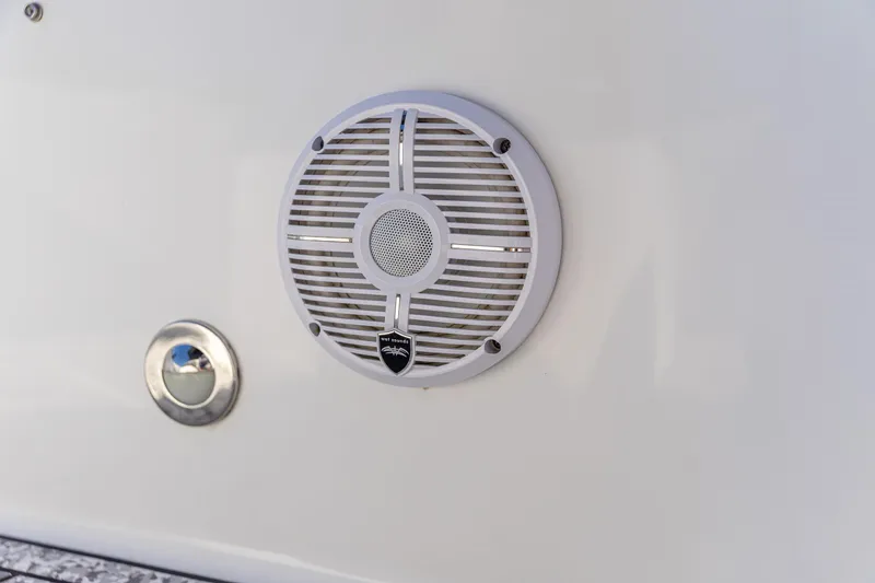 Slide: The Image of Speaker and vent detail on 2022 Crevalle 26 HCO boat exterior. - 8