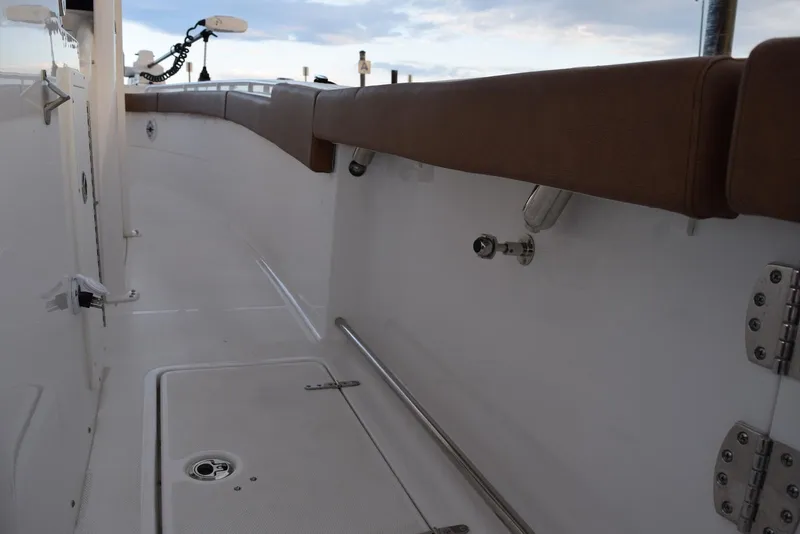 Slide: The Image of Interior view of 2025 Sea Hunt Gamefish 28 Coffin Box boat, featuring sleek design elements. - 10
