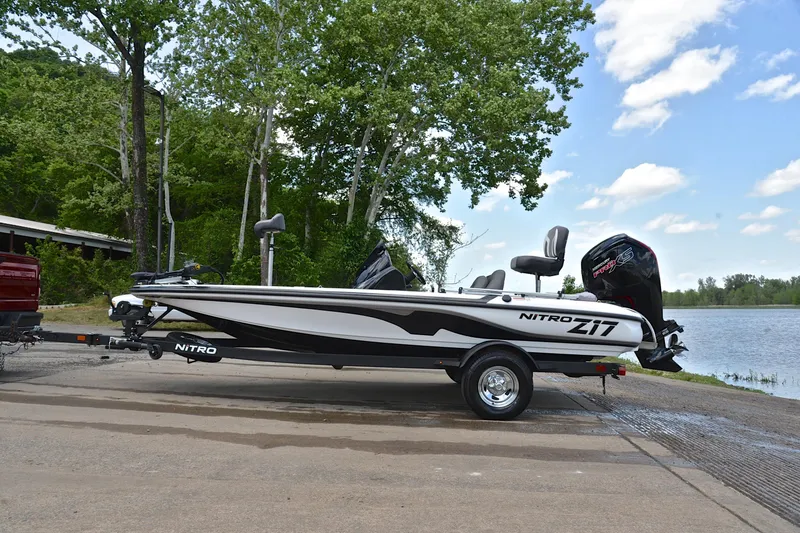 Slide: The Image of 2025 Nitro Z17 boat on trailer by lakeside, ready for launch. - 10