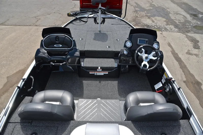 Slide: The Image of Interior view of 2025 Nitro Z17 boat with steering console and seating. - 19