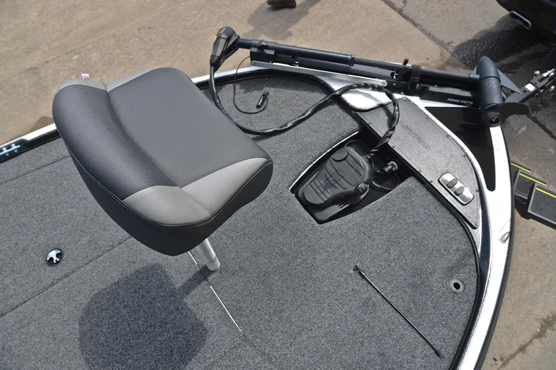 Slide: The Image of 2025 Nitro Z17 boat deck with seat and trolling motor controls. - 23