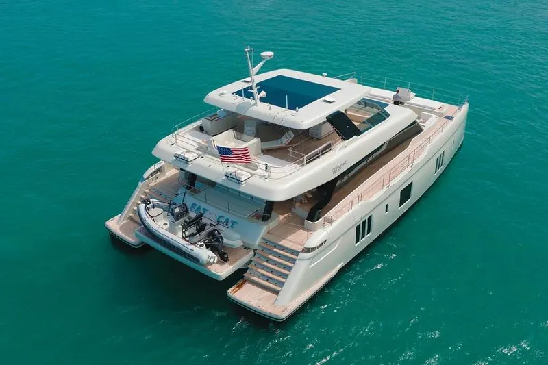 The Image of 2024 Sunreef 80 Power yacht on turquoise water, featuring spacious decks and modern design. - 0
