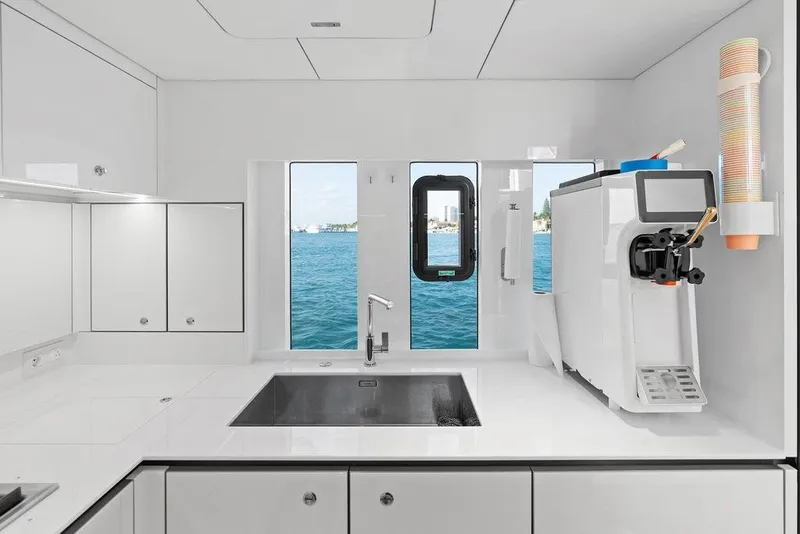 Slide: The Image of Modern kitchen interior on 2024 Sunreef 80 Power yacht with ocean view. - 103