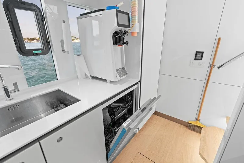 Slide: The Image of Modern kitchen area on 2024 Sunreef 80 Power yacht with sink and appliances. - 104
