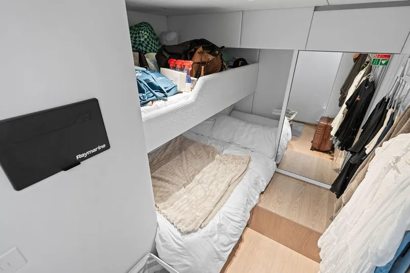 Slide: The Image of Luxurious cabin interior of 2024 Sunreef 80 Power yacht with cozy bedding and ample storage. - 106