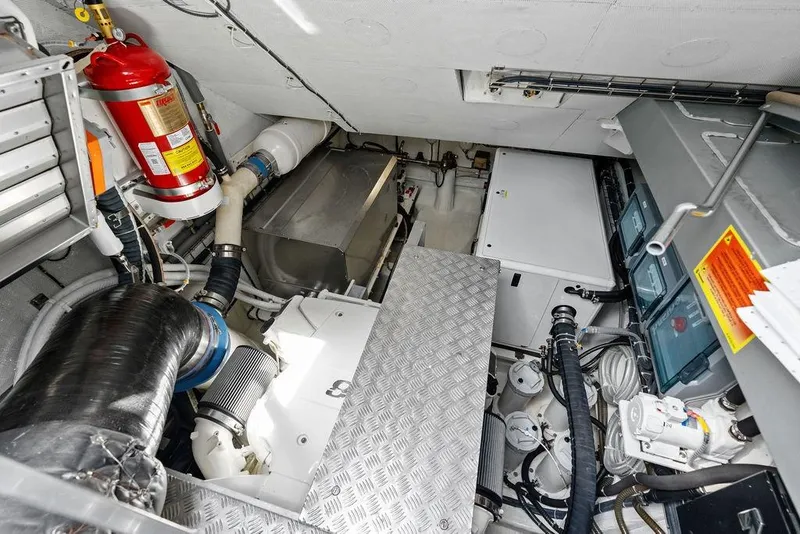 Slide: The Image of Engine room of 2024 Sunreef 80 Power yacht, featuring advanced machinery and safety equipment. - 116