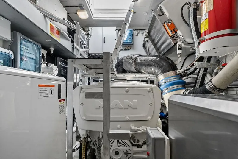 Slide: The Image of Engine room of 2024 Sunreef 80 Power yacht, featuring MAN engine and advanced equipment. - 117