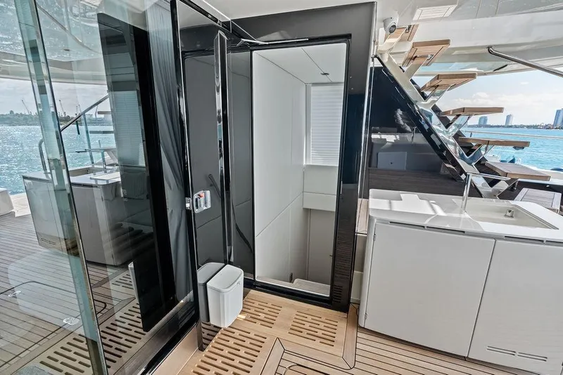 Slide: The Image of Luxurious interior of 2024 Sunreef 80 Power yacht with modern staircase and ocean view. - 22