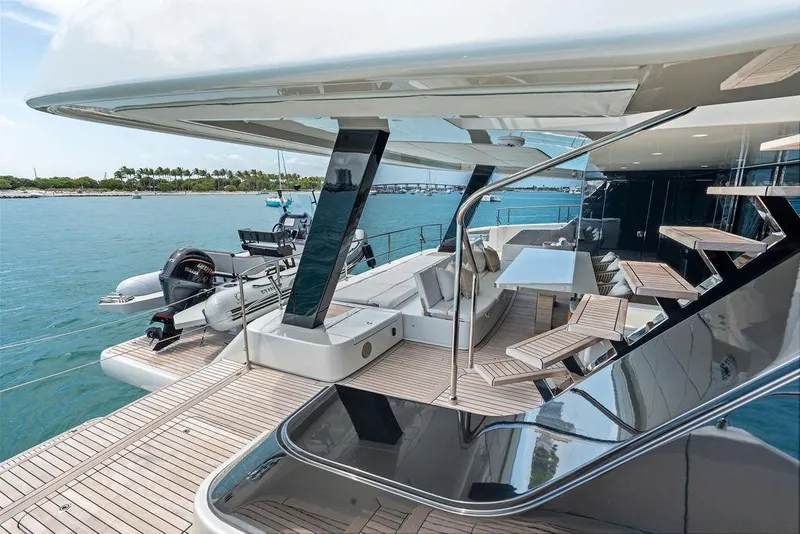 Slide: The Image of Luxurious 2024 Sunreef 80 Power yacht with spacious deck and modern seating area. - 28