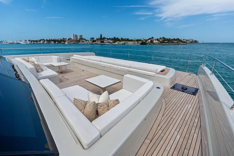 Slide: The Image of Luxurious Sunreef 80 Power yacht deck with elegant seating, ocean view, 2024 model. - 31