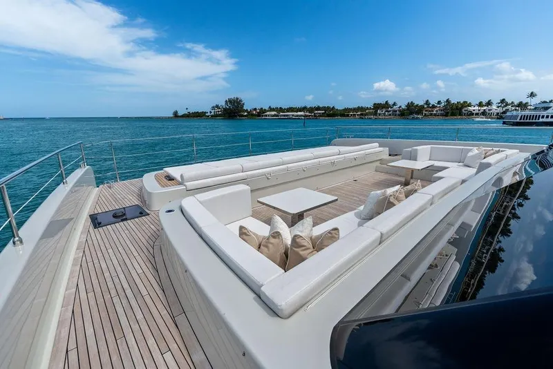Slide: The Image of Luxurious Sunreef 80 Power yacht deck, 2024 model, with elegant seating and ocean view. - 36