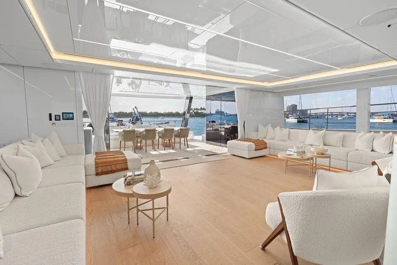 Slide: The Image of Luxurious interior of 2024 Sunreef 80 Power yacht with elegant seating and ocean view. - 39
