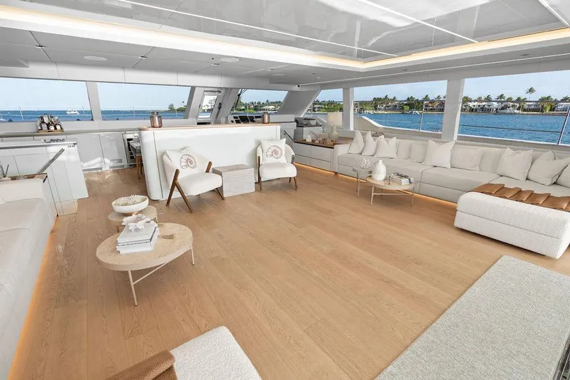 Slide: The Image of Luxurious interior of 2024 Sunreef 80 Power yacht with elegant seating and ocean view. - 41