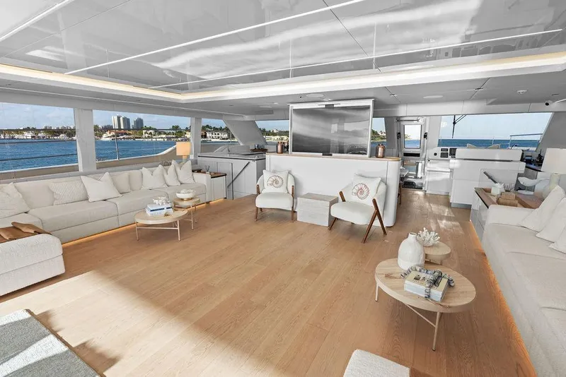 Slide: The Image of Luxurious interior of 2024 Sunreef 80 Power yacht with elegant seating and panoramic windows. - 43