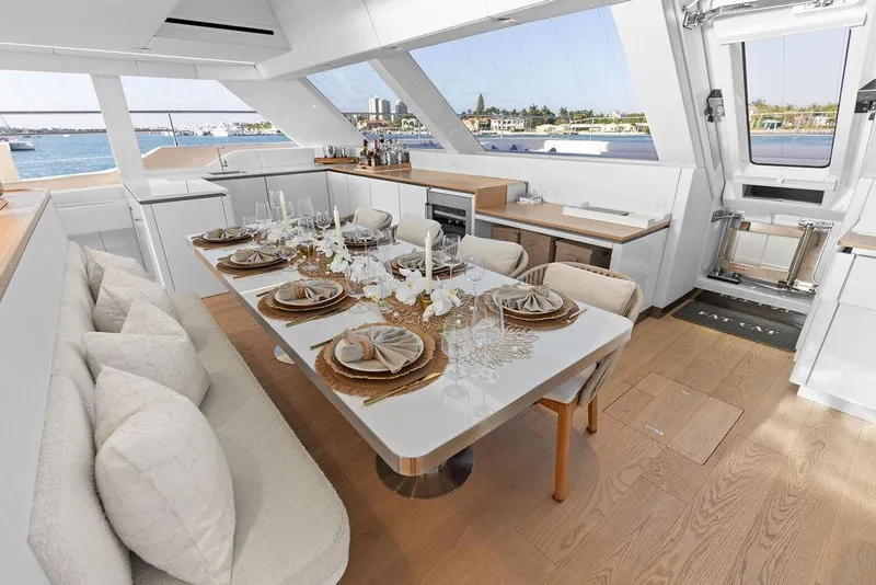 Slide: The Image of Luxurious dining area on 2024 Sunreef 80 Power yacht, elegantly set with ocean view. - 48