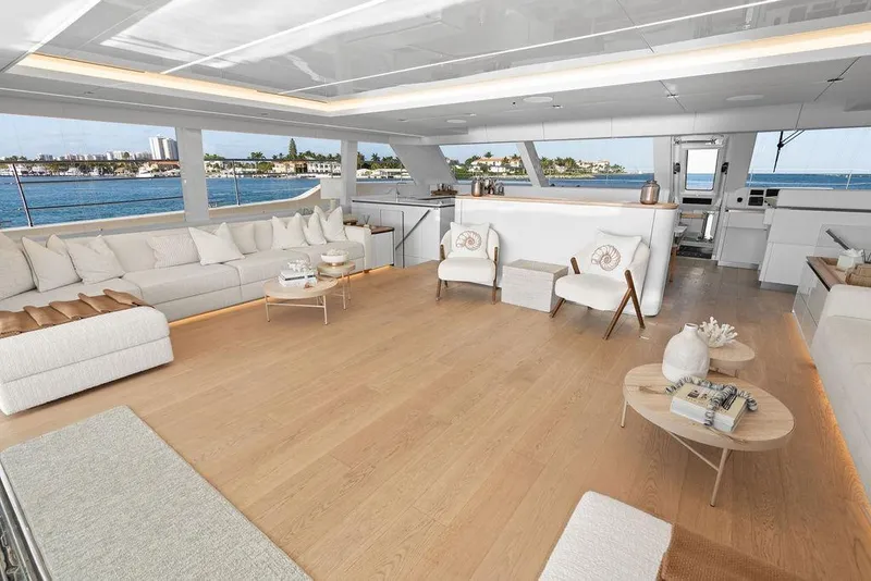 Slide: The Image of Luxurious interior of 2024 Sunreef 80 Power yacht with elegant seating and ocean view. - 49