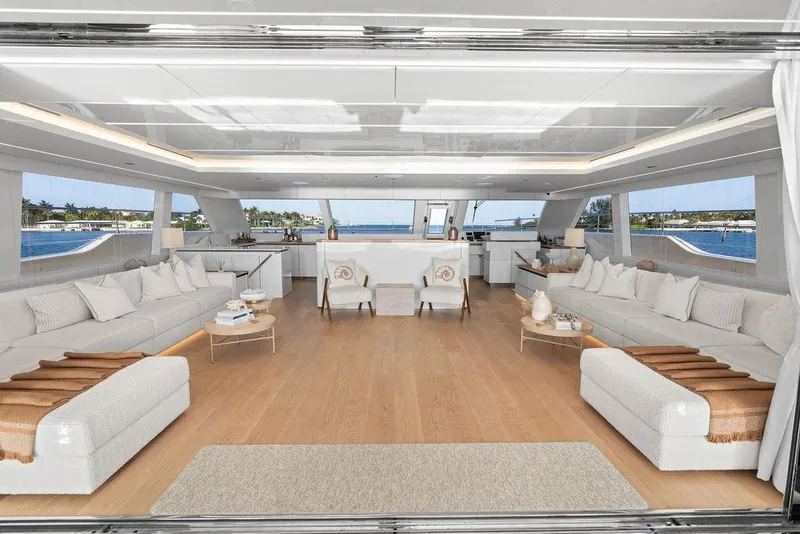 Slide: The Image of Luxurious interior of 2024 Sunreef 80 Power yacht with elegant seating and panoramic windows. - 50