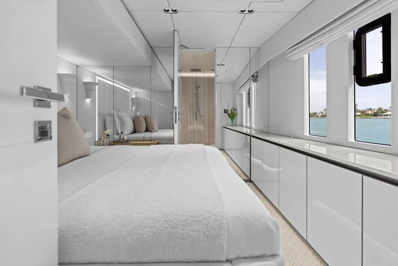 Slide: The Image of Luxurious bedroom interior of 2024 Sunreef 80 Power yacht with ocean view windows. - 65