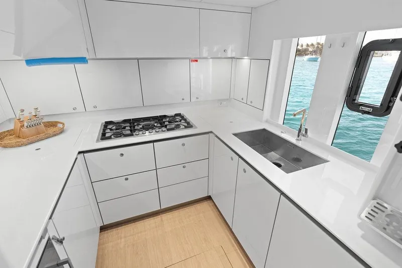 Slide: The Image of Modern kitchen interior on 2024 Sunreef 80 Power yacht with ocean view. - 77
