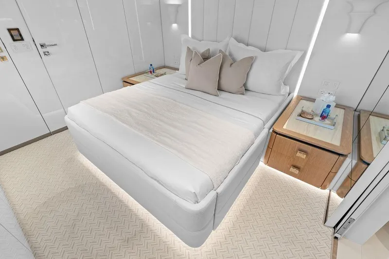 Slide: The Image of Luxurious bedroom interior on 2024 Sunreef 80 Power yacht, featuring elegant bedding and modern design. - 87
