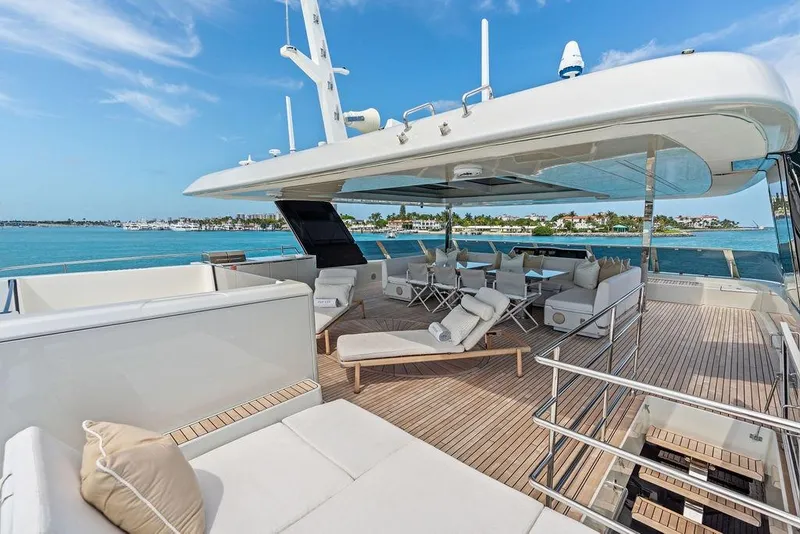 Slide: The Image of Luxurious Sunreef 80 Power yacht deck, 2024 model, featuring elegant seating and ocean views. - 89