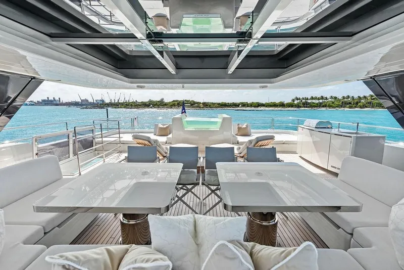 Slide: The Image of Luxurious 2024 Sunreef 80 Power yacht interior with elegant seating and ocean view. - 90