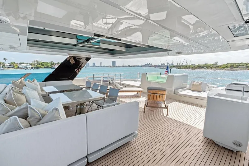 Slide: The Image of Luxurious Sunreef 80 Power yacht deck, 2024 model, featuring elegant seating and ocean views. - 96
