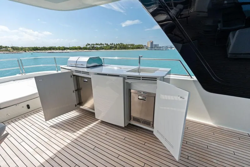 Slide: The Image of Outdoor kitchen on 2024 Sunreef 80 Power yacht, featuring grill and sink with ocean view. - 97