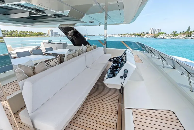 Slide: The Image of Luxurious 2024 Sunreef 80 Power yacht with spacious deck and elegant seating area. - 99