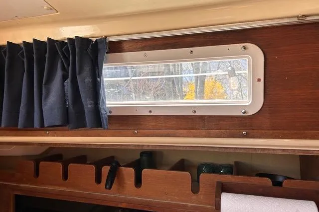 Slide: The Image of Chrome faucet on beige sink, Pearson 34 model, 1984. - 13